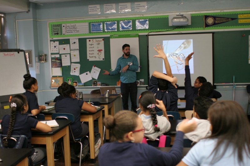 Santos guided the groups of students during work sessions. Photo Credit: AMNH